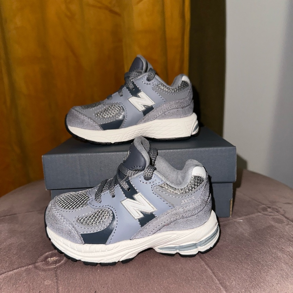 New Balance Kids Sneakers in Gray and White
